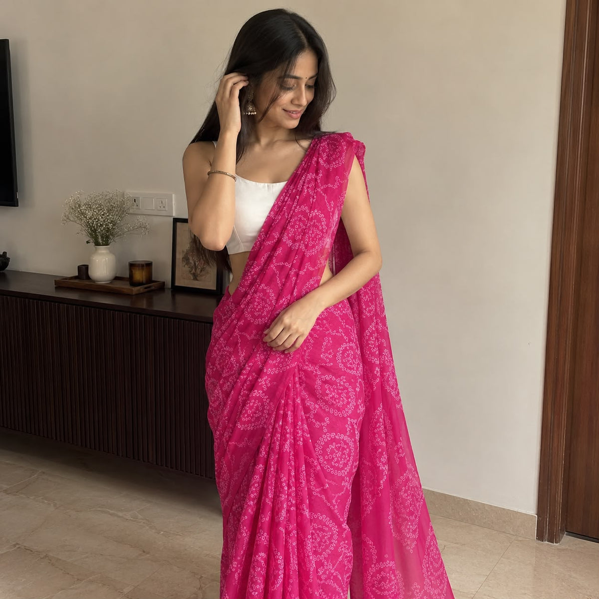 Pink chiffon Bandhani print saree – full drape view on model
