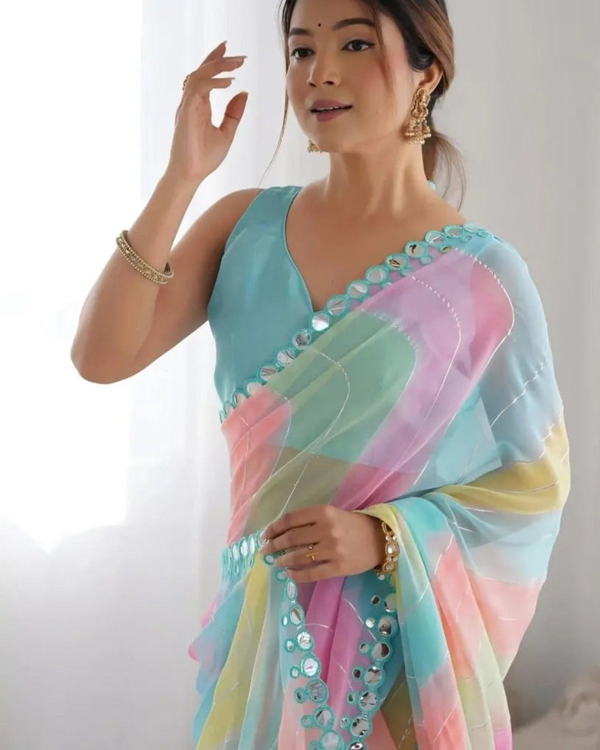 Multicolor chiffon leheriya saree with mirror work border, draped