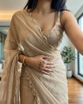Champagne gold organza saree draped, embroidered pearl lace border