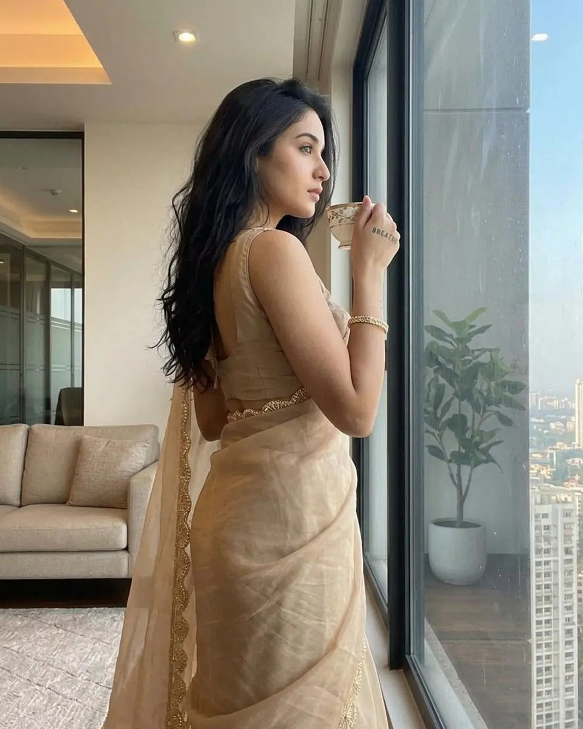 Champagne gold organza saree full drape