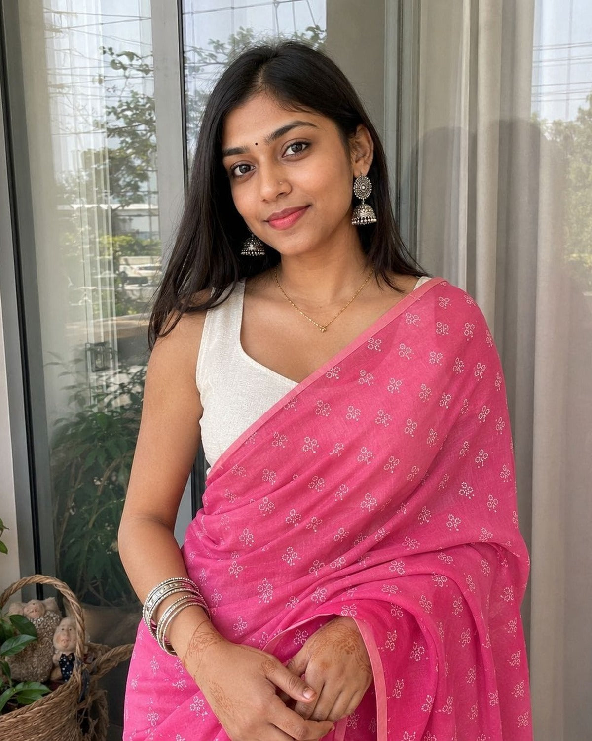 Rani pink floral printed saree draped on model