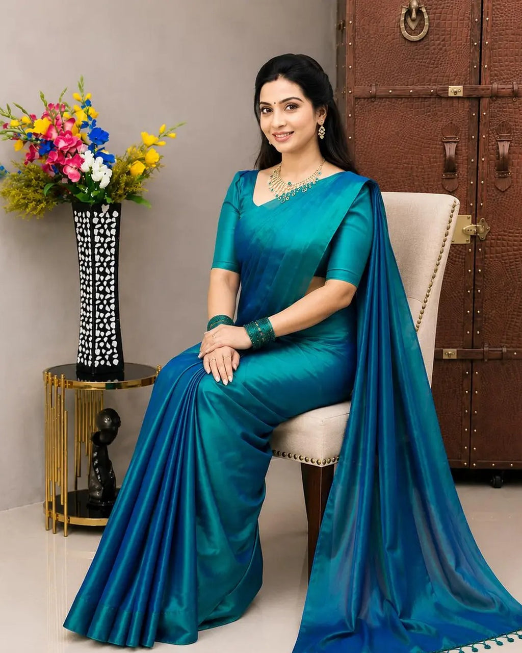 Seated, showing how the tissue saree holds its drape
